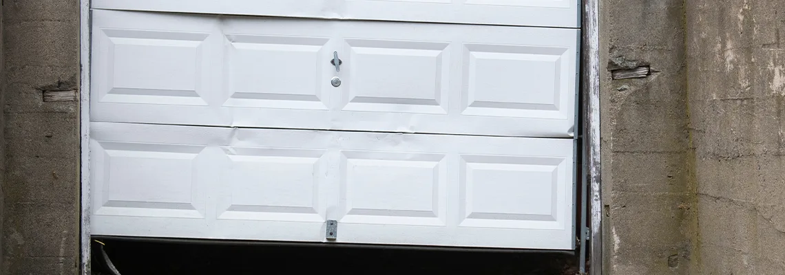 Garage Door Got Hit By A Car Dent Removal in Skokie, IL