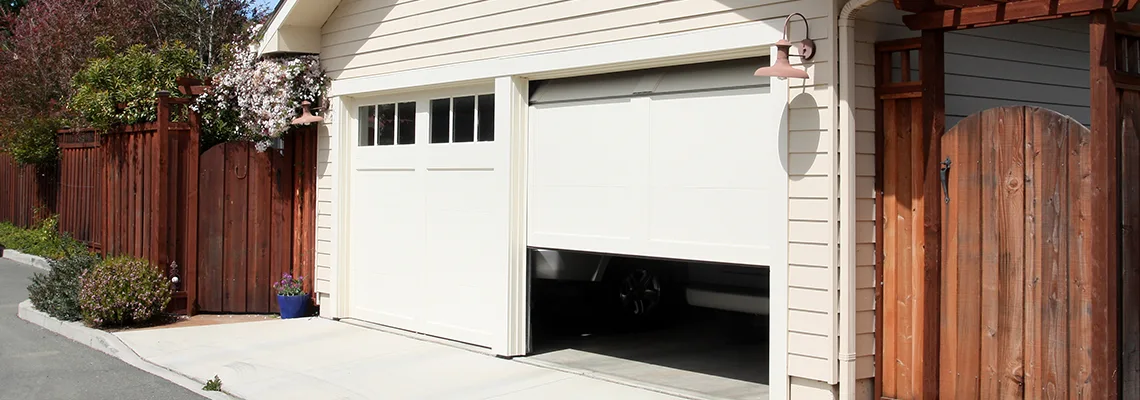 Fix Metal Garage Door Jerking in Skokie, Illinois